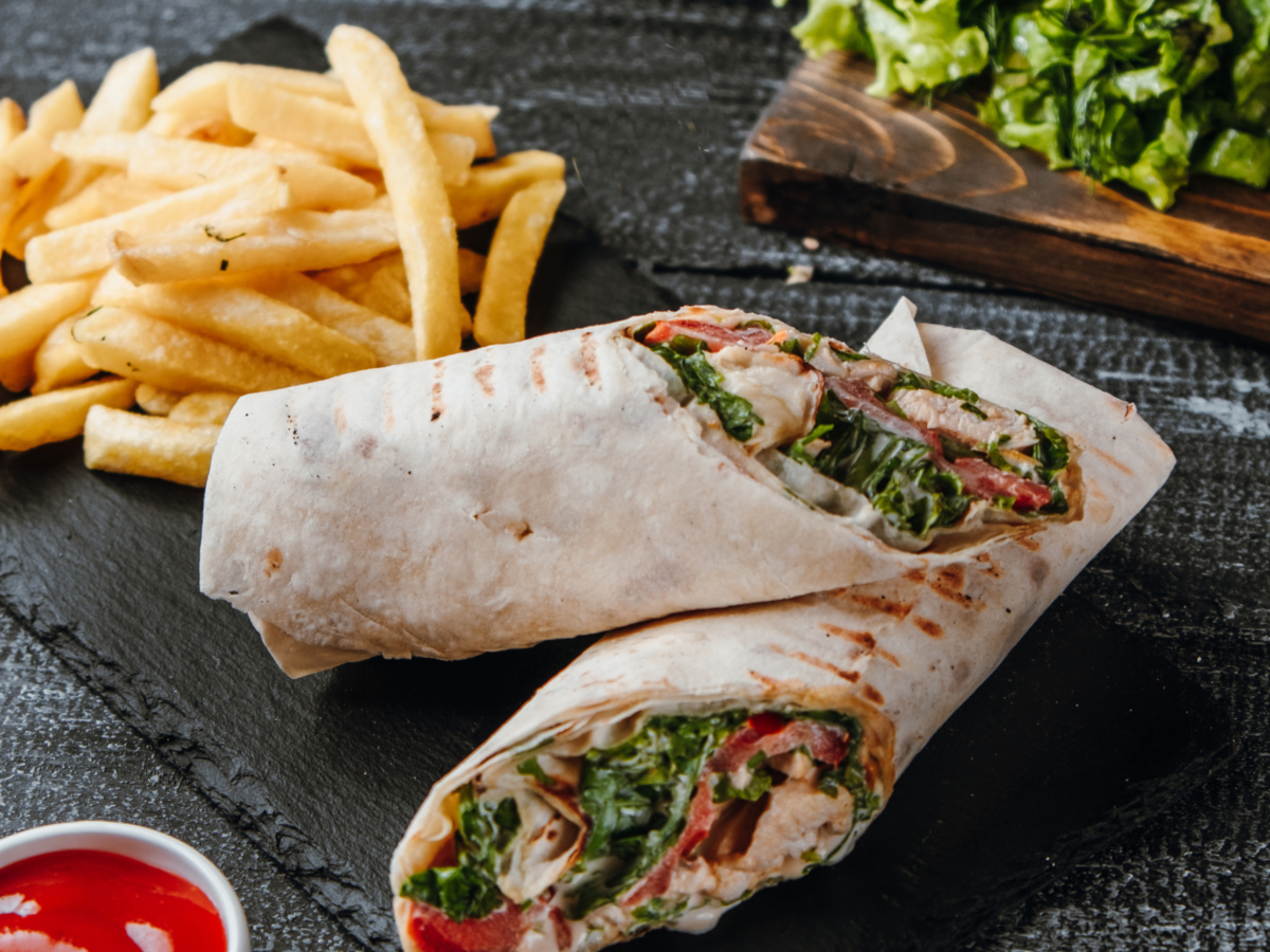 Buritto with chicken french fries table