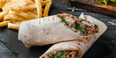 Buritto with chicken french fries table